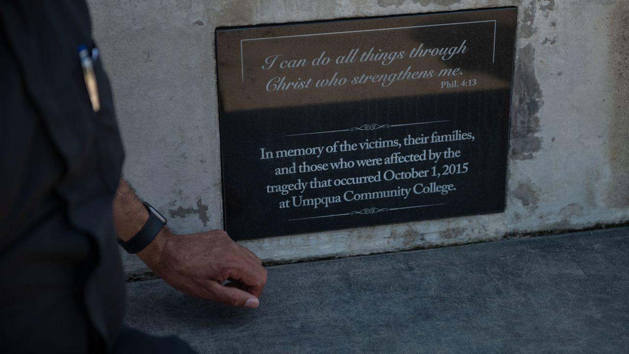A memorial for the victims of a mass shooting in 2015 sits outside a church in Roseburg.