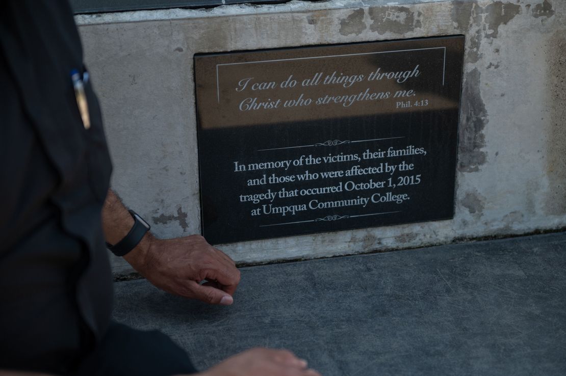 A memorial for the victims of a mass shooting in 2015 sits outside a church in Roseburg.