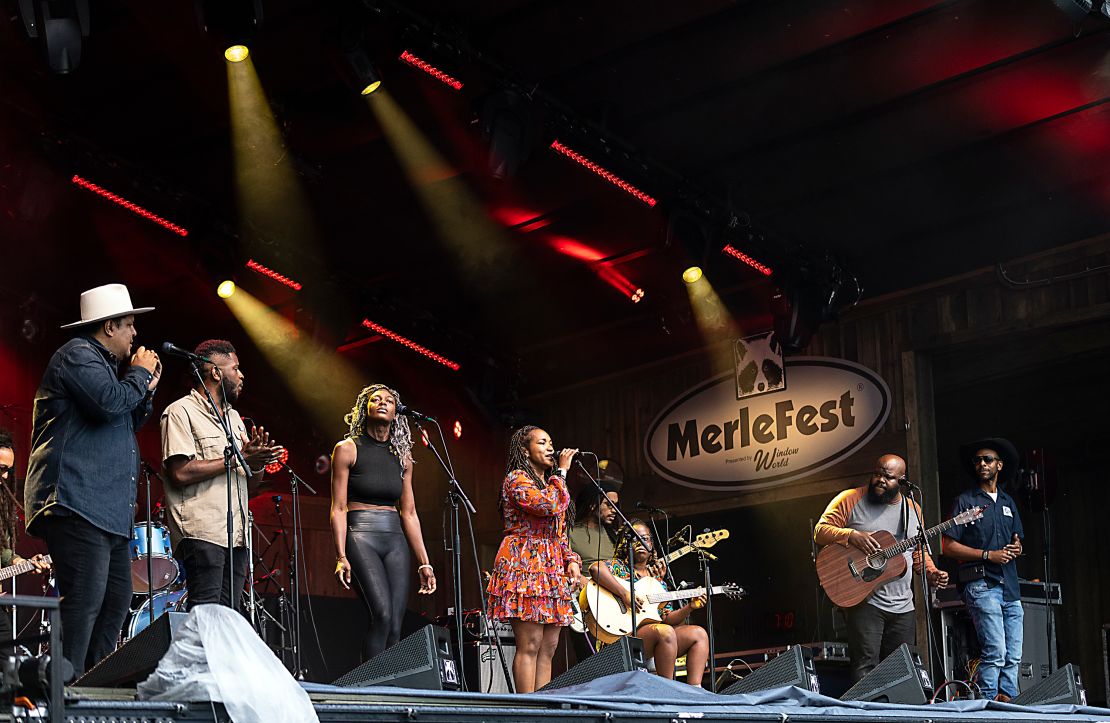 (L-R) Chris Pierce, Mel Washington, Nikki Morgan, Miko Marks, Ping Rose, Yasmin Williams, Leon Timbo and Aaron Vance of The Black Opry Revue performs during MerleFest at Wilkes Community College on April 28, 2023 in Wilkesboro, North Carolina.