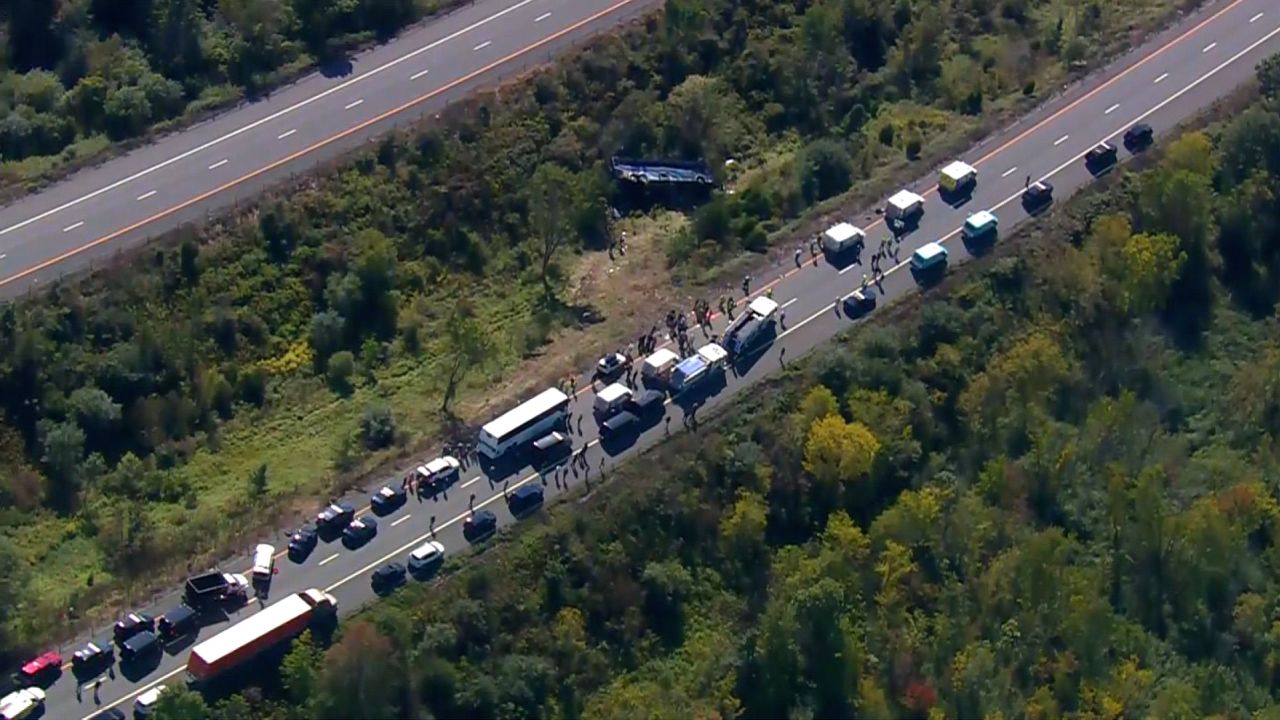 A school spokeswoman said the bus was headed to a band camp concert.