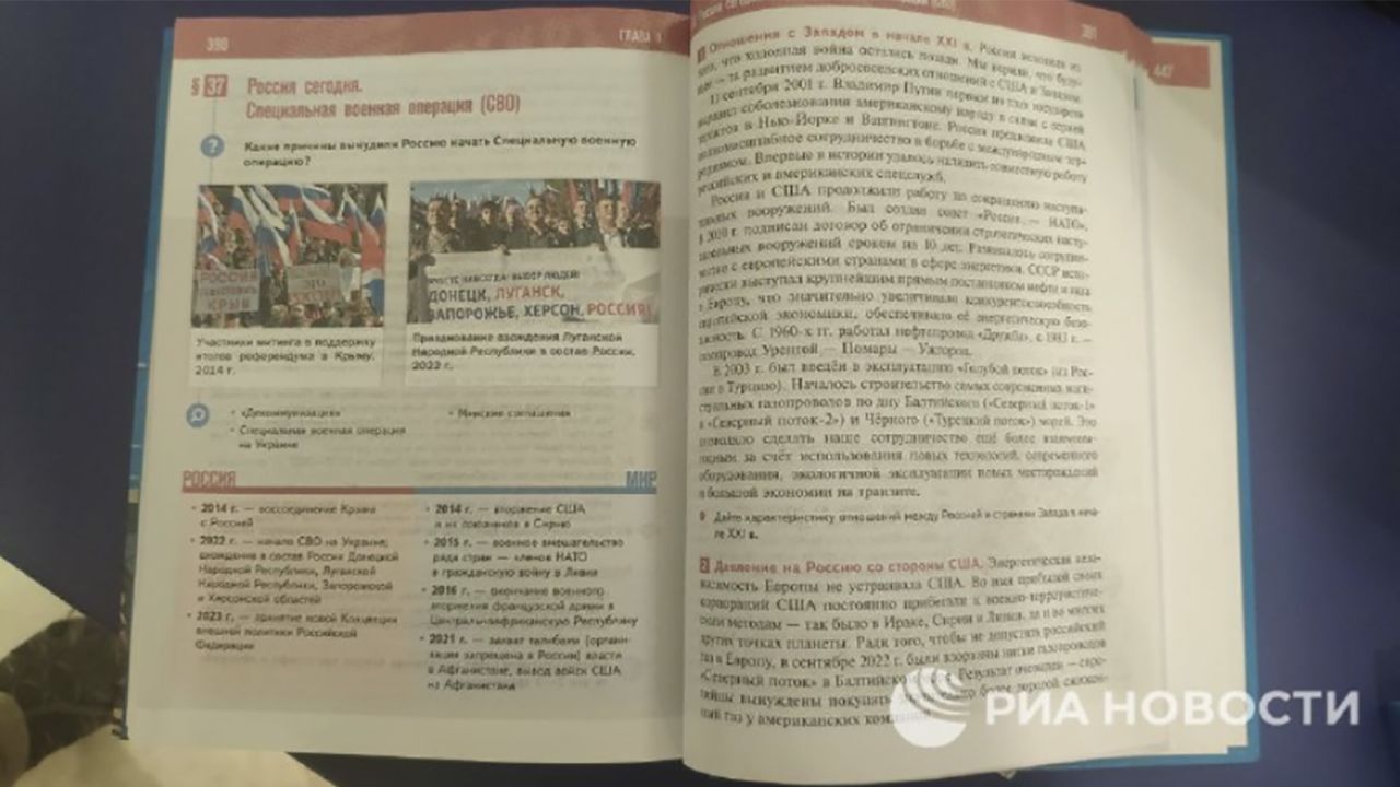Russian state media RIA Novosti shows photos of a new history book with a chapter on the "special military operation," Russia's name for its war on Ukraine.