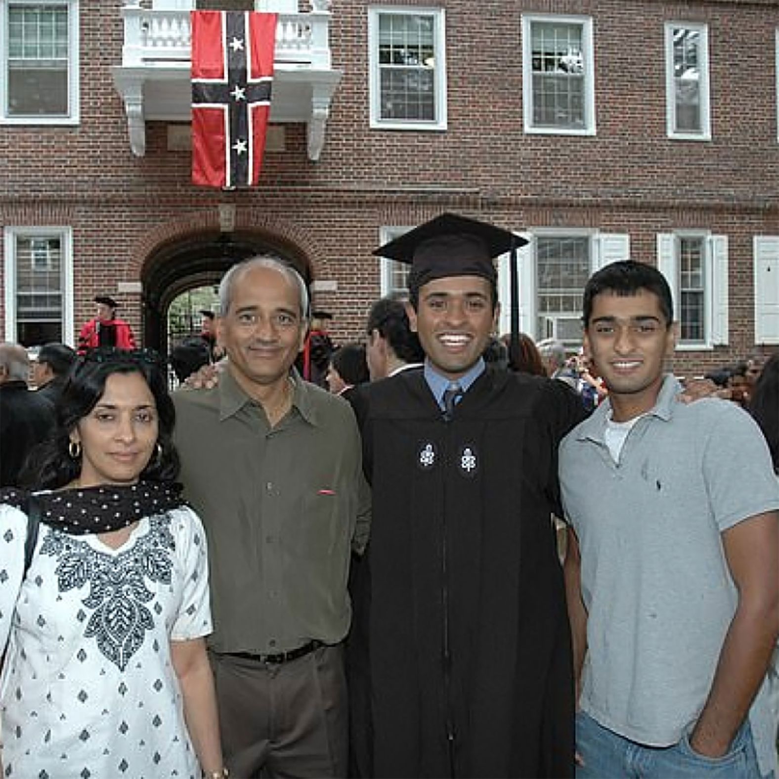 Ramaswamy poses with his parents and his younger brother after graduating from Harvard University.