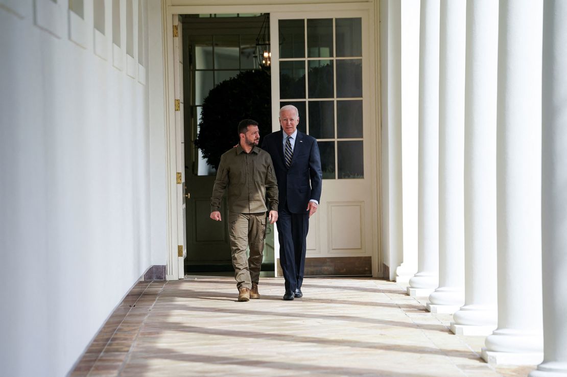 Ukrainian President Volodymyr Zelensky walks down the White House colonnade to the Oval Office with President Joe Biden during a visit to the White House in Washington, DC, on September 21.
