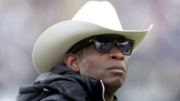 BOULDER, COLORADO - APRIL 22: Head coach Deion Sanders of the Colorado Buffaloes watches as his team warms up prior to their spring game at Folsom Field on April 22, 2023 in Boulder, Colorado. (Photo by Matthew Stockman/Getty Images)