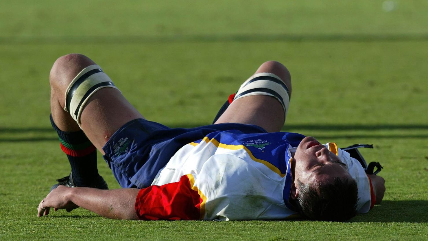 Namibia's Jurgens van Lill lies flat out after Australia score yet another try in thier 142-0 victory during the Rugby World Cup Pool A match at the Oval Stadium, Adelaide. NO MOBILE PHONE USE. INTERNET SITES MAY ONLY USE ONE IMAGE EVERY FIVE MINUTES DURING THE MATCH   (Photo by David Davies - PA Images/PA Images via Getty Images)