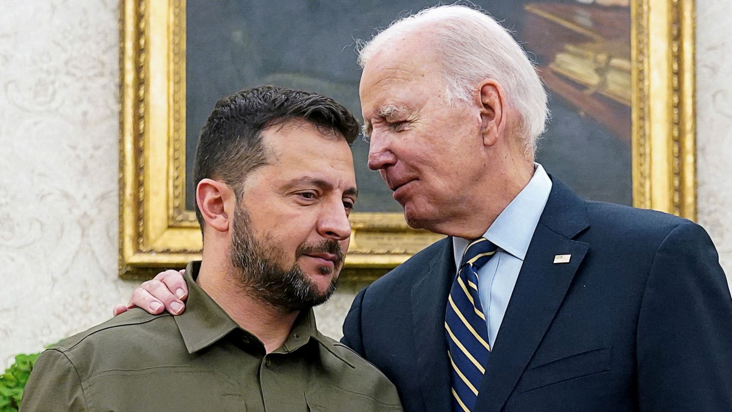 Ukrainian President Volodymyr Zelenskiy is embraced by U.S. President Joe Biden in the Oval Office of the White House in Washington, September 21, 2023. REUTERS/Kevin Lamarque     TPX IMAGES OF THE DAY