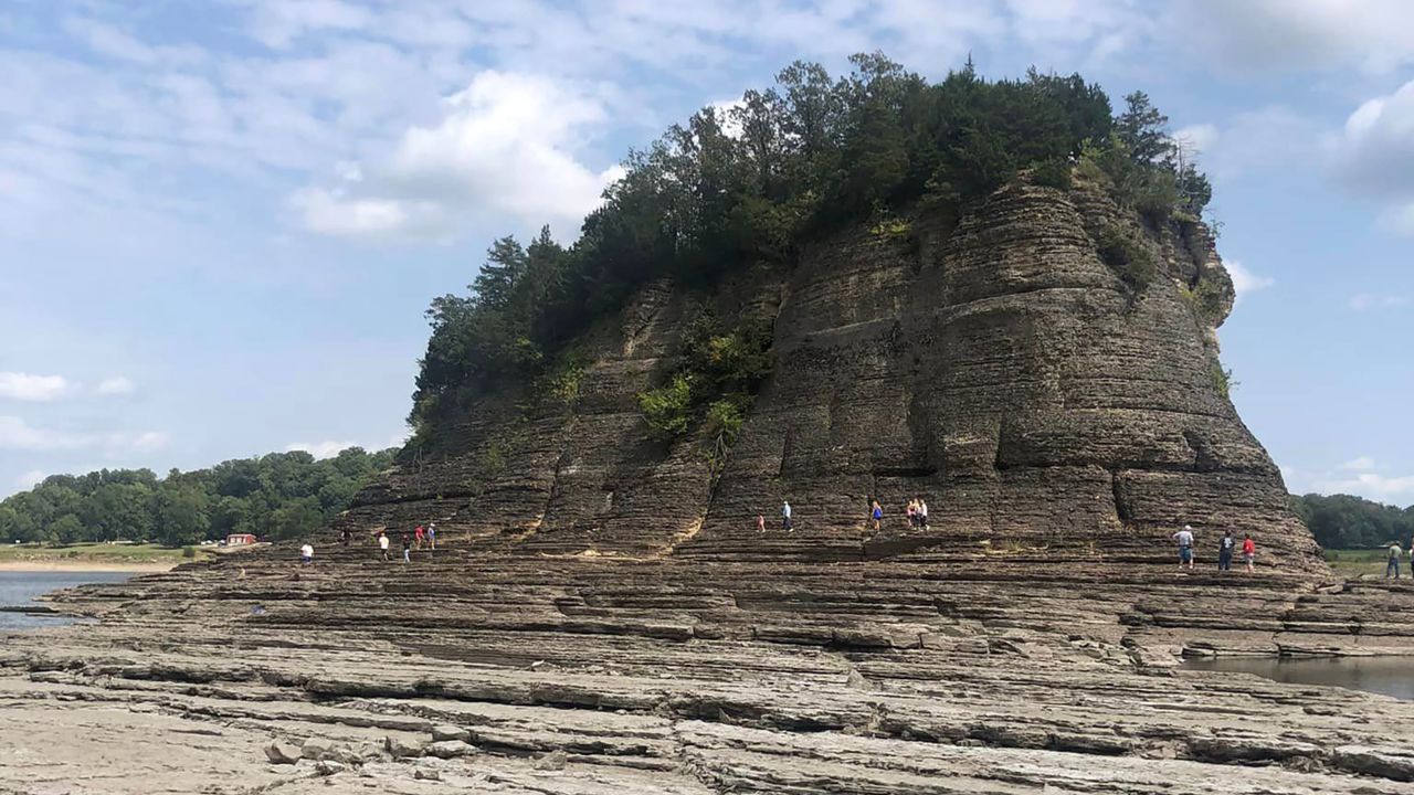 Mighty Mississippi River is so low people can make rare walk to rock formation