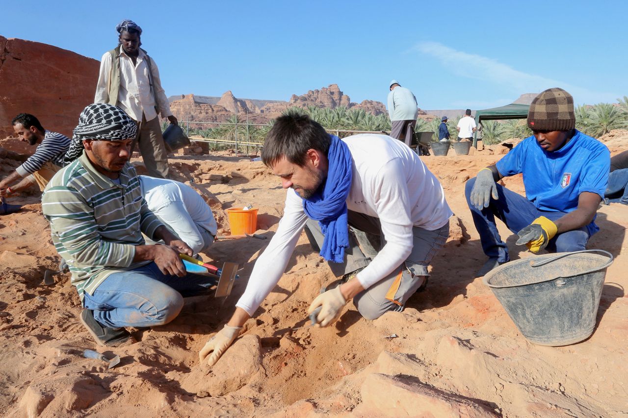 A French archaeologist and his co-workers carefully clean the pottery to examine the findings known to be from Dadan and Lihyan civilisation dated back to the second half of the first millennium BC, in Al-Ula, Saudi Arabia October 30, 2021. Picture taken October 30, 2021. REUTERS/Ahmed Yosri