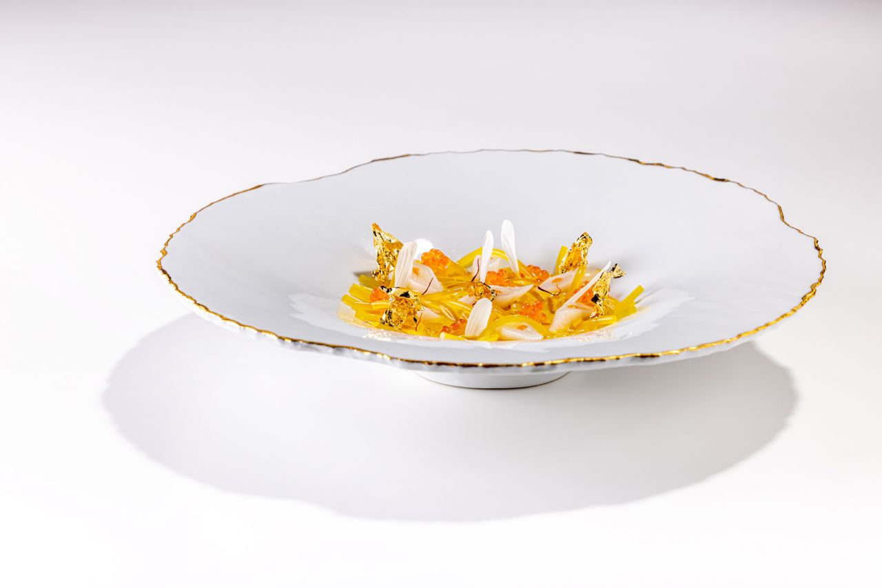 Saffron and cold razor clam fideuá is one of the dishes on Quique Dacosta's tasting menu.