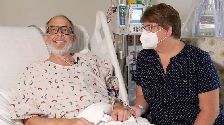 In this photo provided by the University of Maryland School of Medicine, Lawrence Faucette sits with wife, Ann, in the school's hospital in Baltimore, Md., in September 2023, before receiving a pig heart transplant.