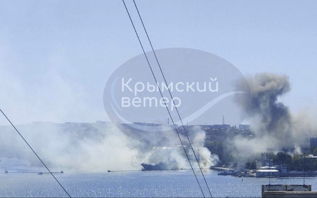 This image taken from UGC video, uploaded to Telegram with a watermark, shows smoke rising from the headquarters of Russia's Black Sea Fleet.