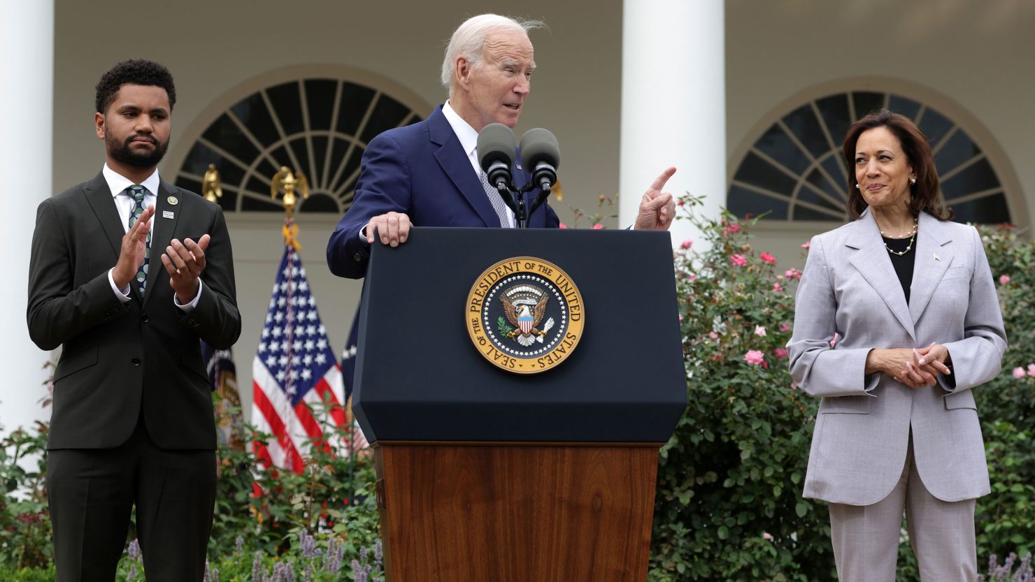 President Joe Biden speaks as  Rep. Maxwell Frost and Vice President Kamala Harris listen during a Rose Garden event on gun safety at the White House on September 22, 2023 in Washington, DC.