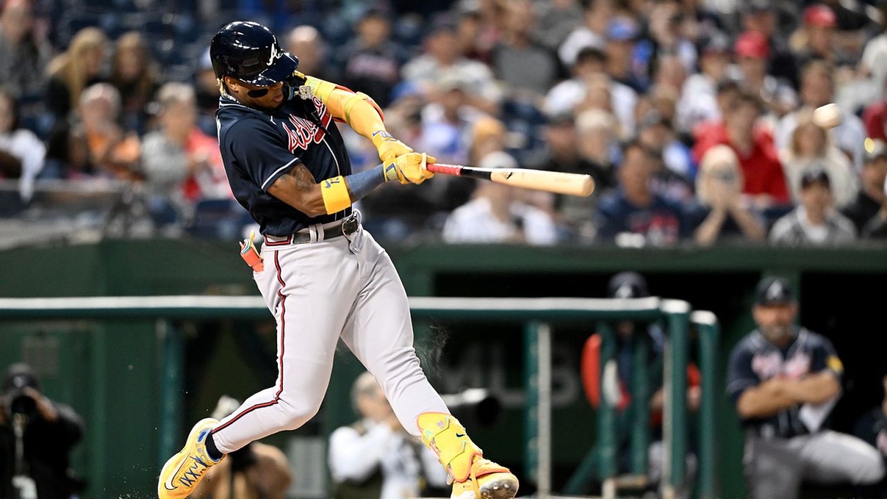 WASHINGTON, DC - SEPTEMBER 22: Ronald Acuna Jr. #13 of the Atlanta Braves hits a home run in the first inning against the Washington Nationals at Nationals Park on September 22, 2023 in Washington, DC. The home run was Acuna's 40th of the season. (Photo by Greg Fiume/Getty Images)