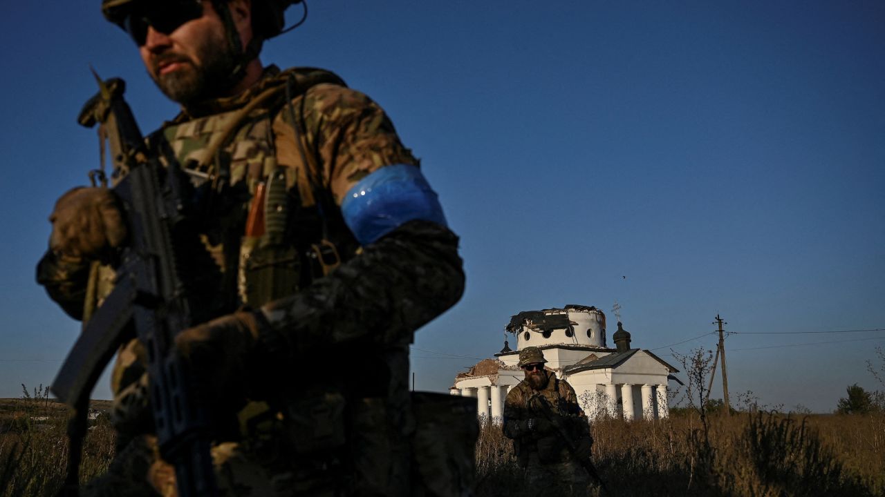 Ukrainian servicemen conduct a reconnaissance mission on September 7.