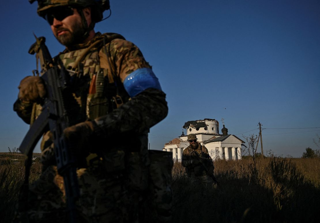 Ukrainian servicemen conduct a reconnaissance mission on September 7.