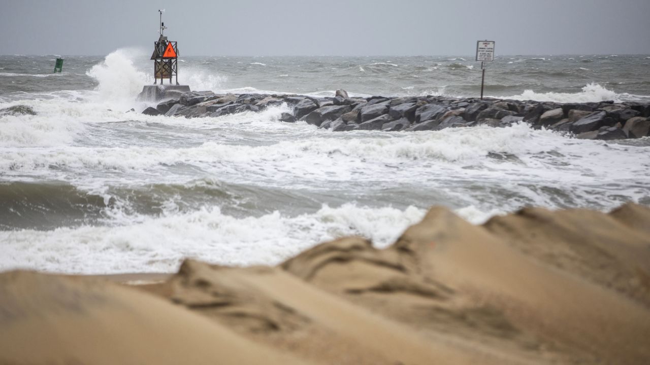 Waves break along the jetty at Rudee Inlet in Virginia Beach, Va., on Friday, Sept. 22, 2023 as Tropical Storm Ophelia approaches the area.
