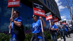 Striking Writers Guild of America workers picket outside the Sunset Bronson Studios building on May 2, 2023 in Los Angeles, California.