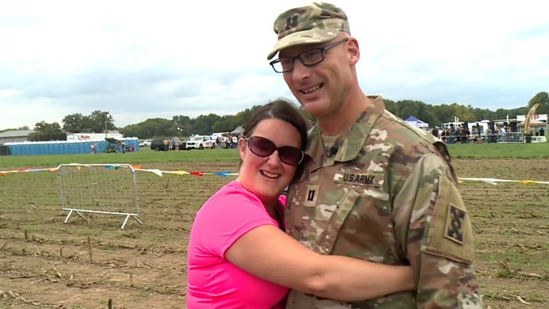 Watch wife's reaction when Army soldier husband surprises her in line at concert