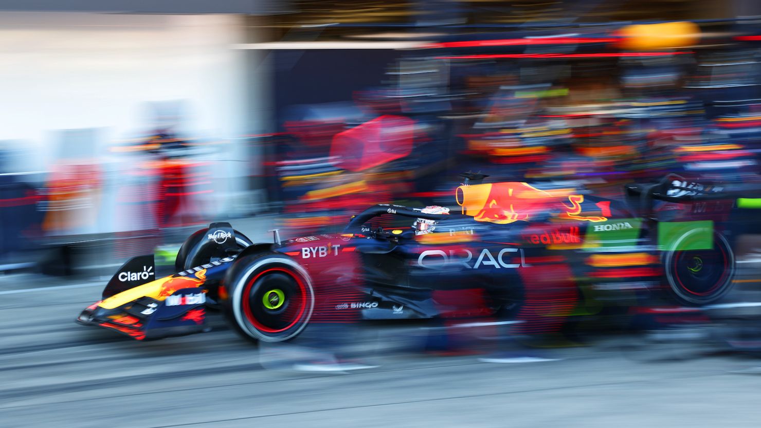 SUZUKA, JAPAN - SEPTEMBER 24: Max Verstappen of the Netherlands driving the (1) Oracle Red Bull Racing RB19 makes a pitstop during the F1 Grand Prix of Japan at Suzuka International Racing Course on September 24, 2023 in Suzuka, Japan. (Photo by Dan Istitene - Formula 1/Formula 1 via Getty Images)