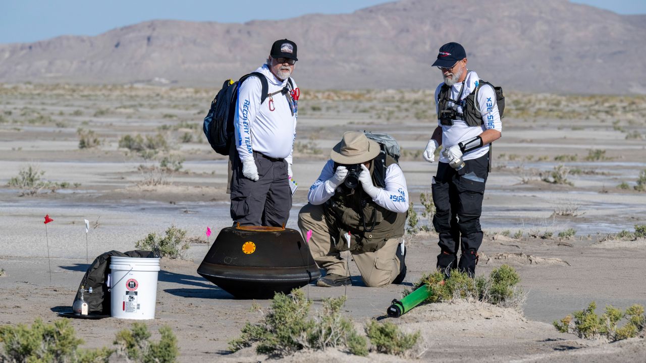 From left to right, NASA Sample Return Capsule Science Lead Scott Sandford, NASA Astromaterials Curator Francis McCubbin, and University of Arizona OSIRIS-REx Principal Investigator Dante Lauretta, collect science data, Sunday, Sept. 24, 2023, shortly after the sample return capsule from NASA's OSIRIS-REx mission landed at the Department of Defense's Utah Test and Training Range. The sample was collected from the asteroid Bennu in October 2020 by NASA's OSIRIS-REx spacecraft.