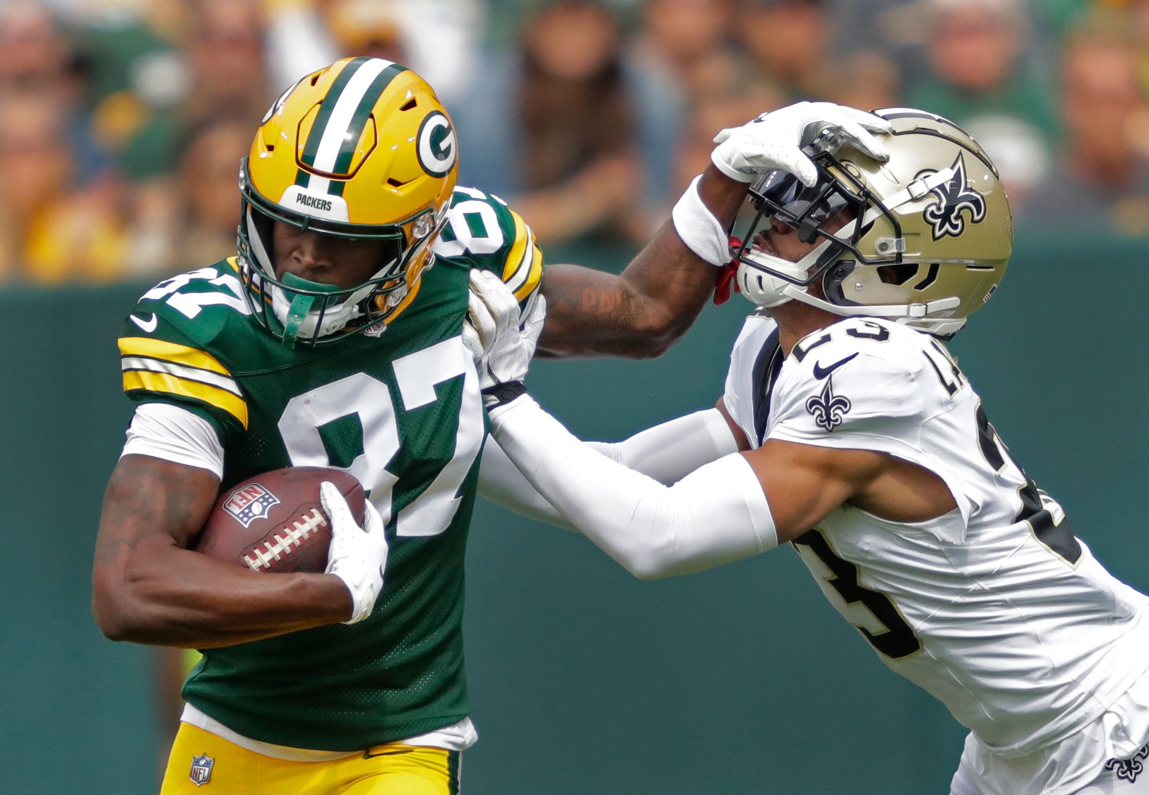 August 11, 2023: Romeo Doubs (87) of the Green Bay Packers goes high to  catch the ball for a touchdown during the NFL preseason game between the  Green Bay Packers and Cincinnati