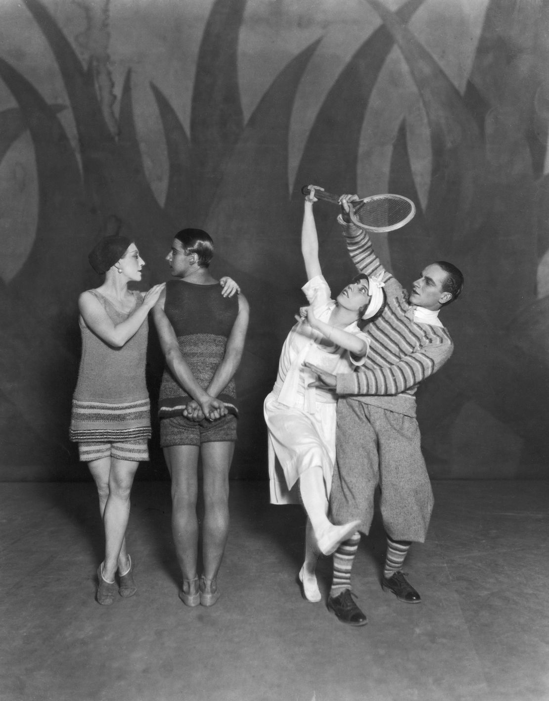 L-R: Lydia Sokolova (born Hilda Munnings, 1896 - 1974), Anton Dolin (1904 - 1983), Bronislava Nijinska and Leon Woizikowsky in the Diaghilev Ballets Russes production of 'Le Train Bleu', London. Billed as an 'oper+tte dans+e' by Jean Cocteau, this was the ballet's only production. The roles of the tennis champion (Nijinska) and the golfer (Woizikowsky) were inspired by Suzanne Lenglen and Edward Prince of Wales respectively. Music by Darius Milhaud, choreography by Bronislava Nijinska, costumes by Coco Chanel, and scenery by Henri Laurens.   (Photo by Sasha/Hulton Archive/Getty Images)