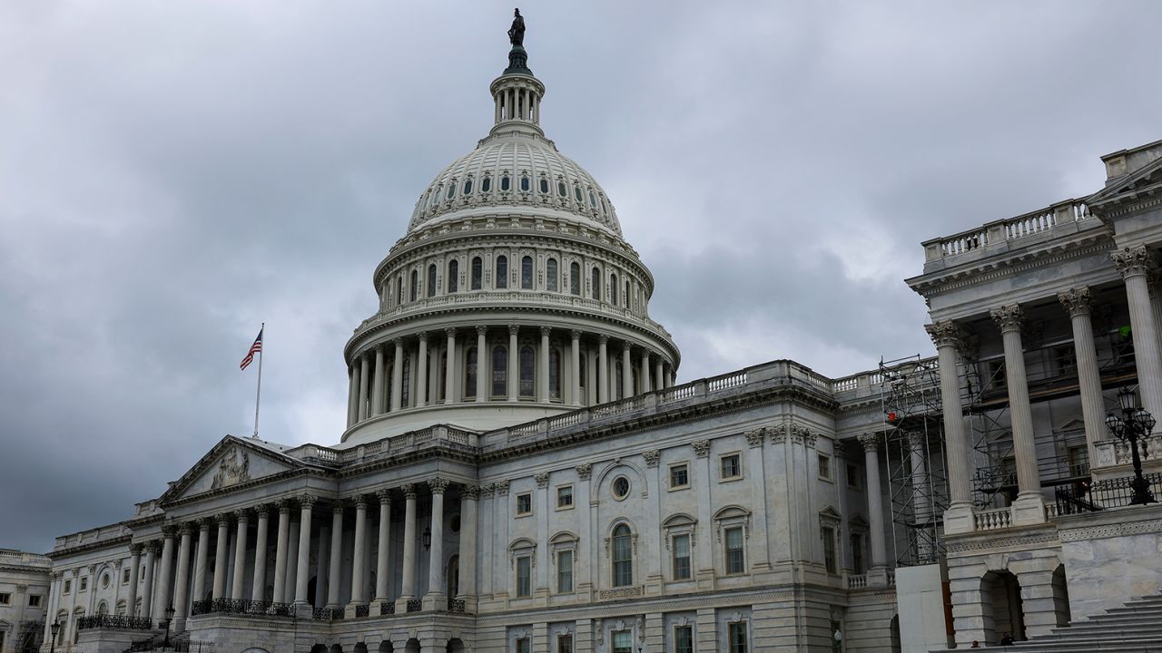 Rain clouds hang over the US Capitol on September 6, 2022.