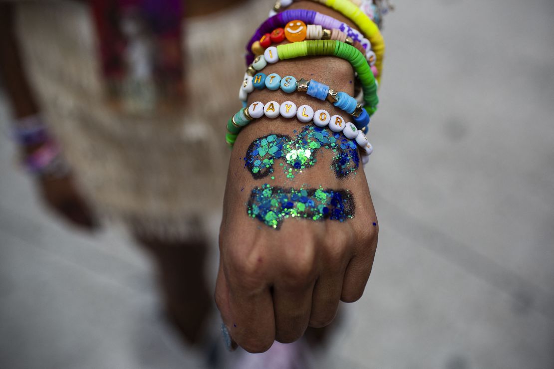 A fan shows a bracelet with the name of US superstar Taylor Swift before her presentation at the Foro Sol in Mexico City on August 24, 2023.