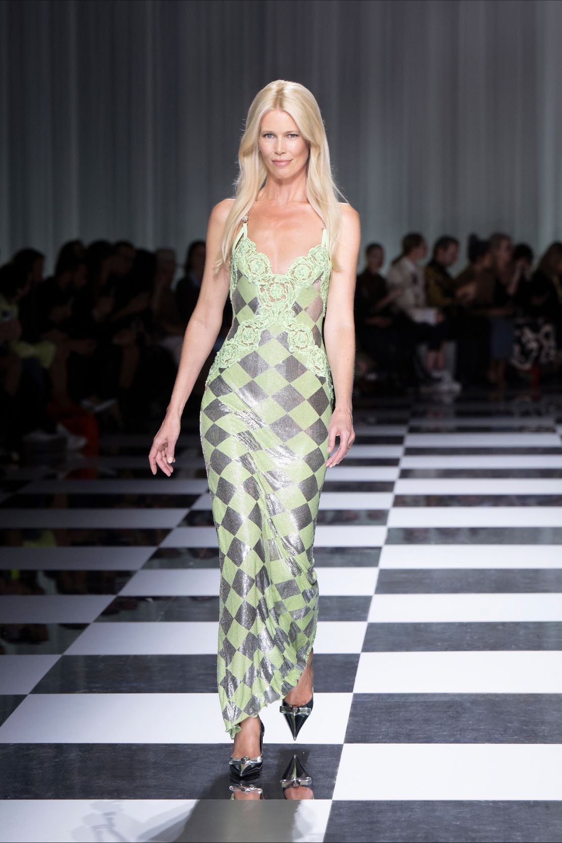 Supermodel of the 1990s, Claudia Schiffer, returned to the runway for a nostalgic moment during the Versace show.