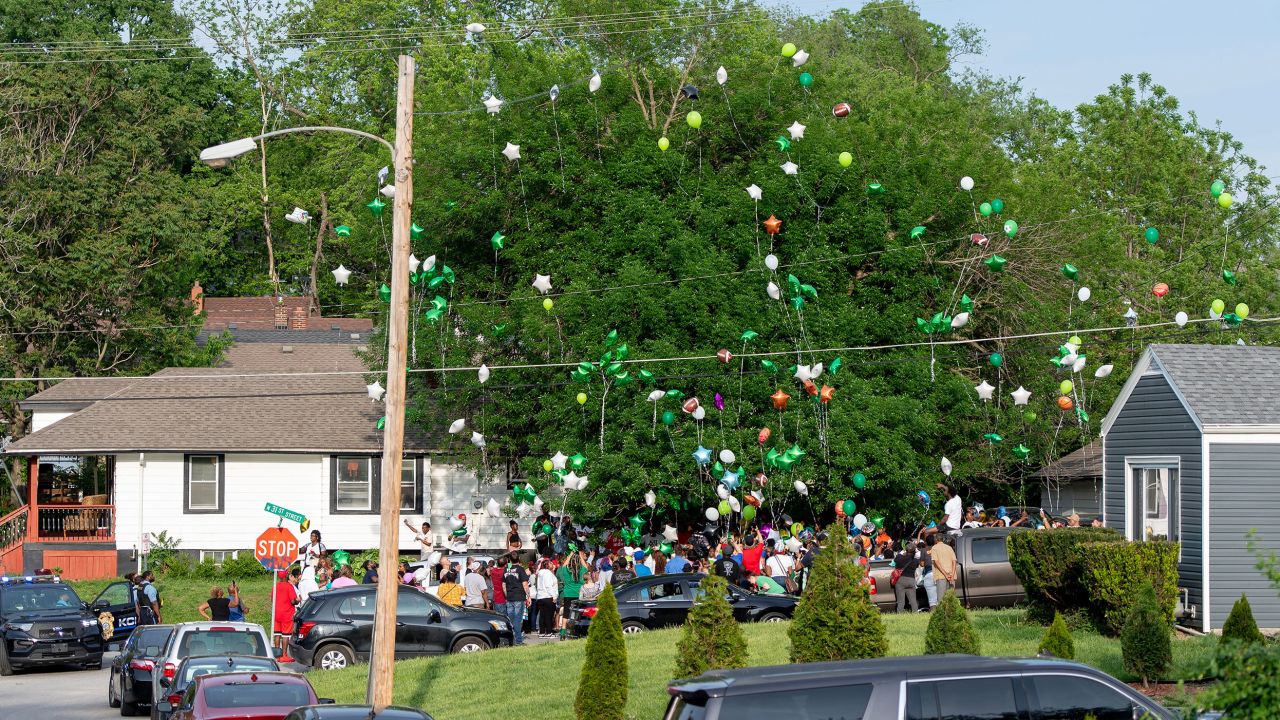 People release balloons during a vigil for Sir'Antonio on May 10 in Kansas City, Kansas.