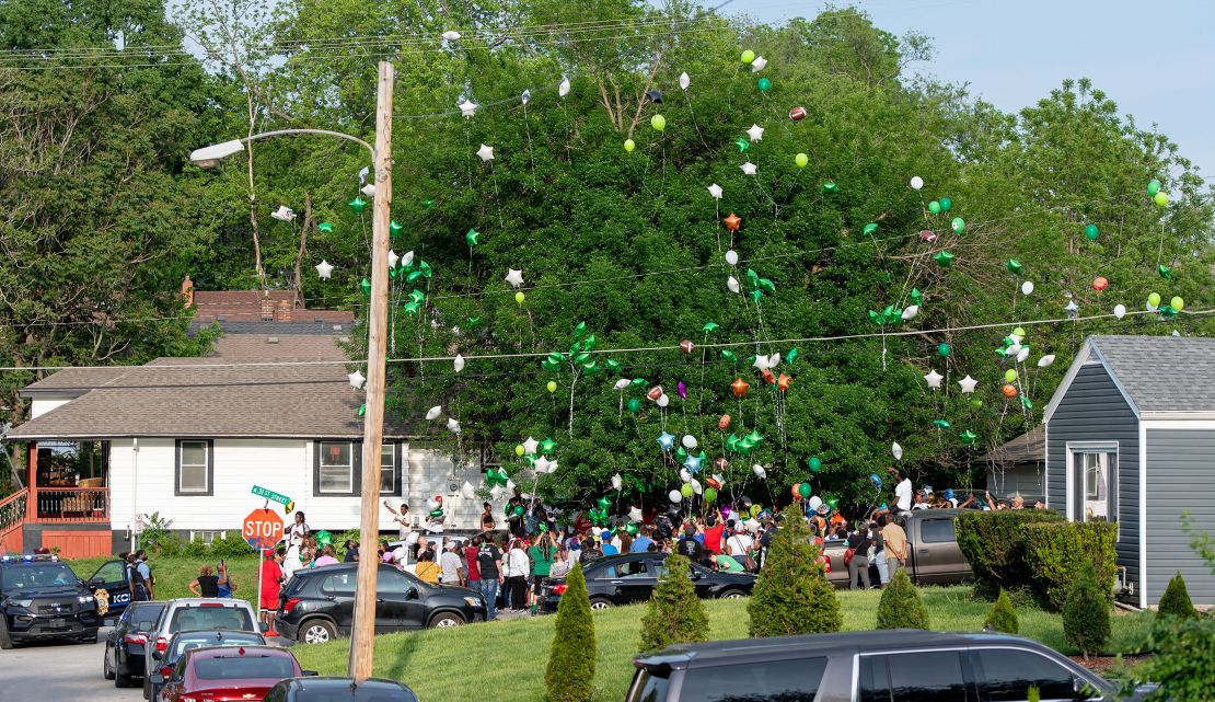 People release balloons during a vigil for Sir'Antonio on May 10 in Kansas City, Kansas.