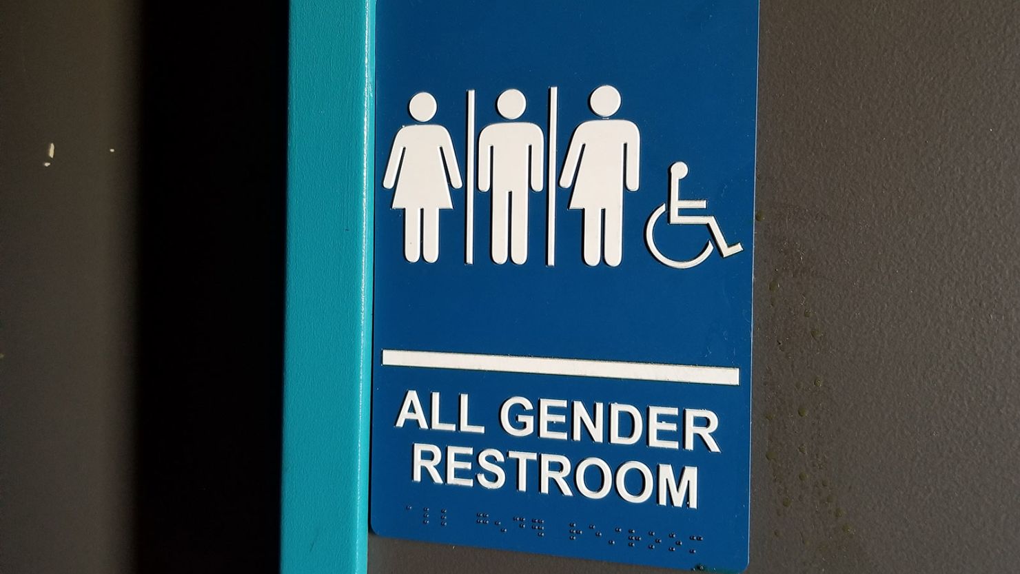 California's new law requires gender-neutral bathroom to have signage identifying the space as being open to all genders. 
