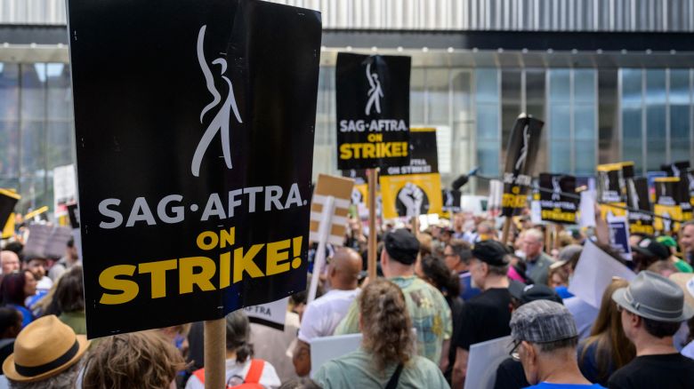 Actors, writers and other union members join SAG-AFTRA and WGA strikers on a picket line in front of HBO/Amazon during the National Union Solidarity Day in New York on August 22, 2023. The SAG-AFTRA walkout, and another strike by film and TV writers that began in May over pay and the threat of artificial intelligence, have brought US film and television production to a halt. (Photo by ANGELA WEISS / AFP) (Photo by ANGELA WEISS/AFP via Getty Images)