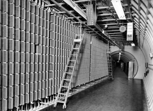 LONDON - JANUARY 1957: (FILE PHOTO) In this handout photgraph released by BT (British Telecommunications) Media Image Library, a general view of Kingsway TAT Repeater Station, MDF Chamber in the Kingsway Tunnel, Holborn on January 1957 in  London, England. The formerly secret tunnels were built 100 feet under central London as fully equipped air raid shelters in 1940 and could accommodate 8000 people. They have been used by MI6 and the Public Records Office to hold 400 tons of secret documents. Current owners British Telecom (BT) once housed the London trunk exchange of the secure Transatlantic hot line between the Presidents of the US and the Soviet Union.   (Photo by BT Media Image Library via Getty Images)