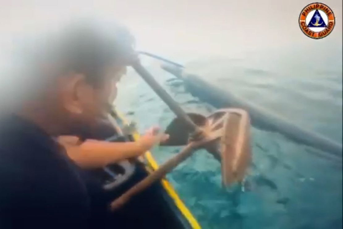 A small crew reached the barrier near Scarborough Shoal in a native fishing boat.