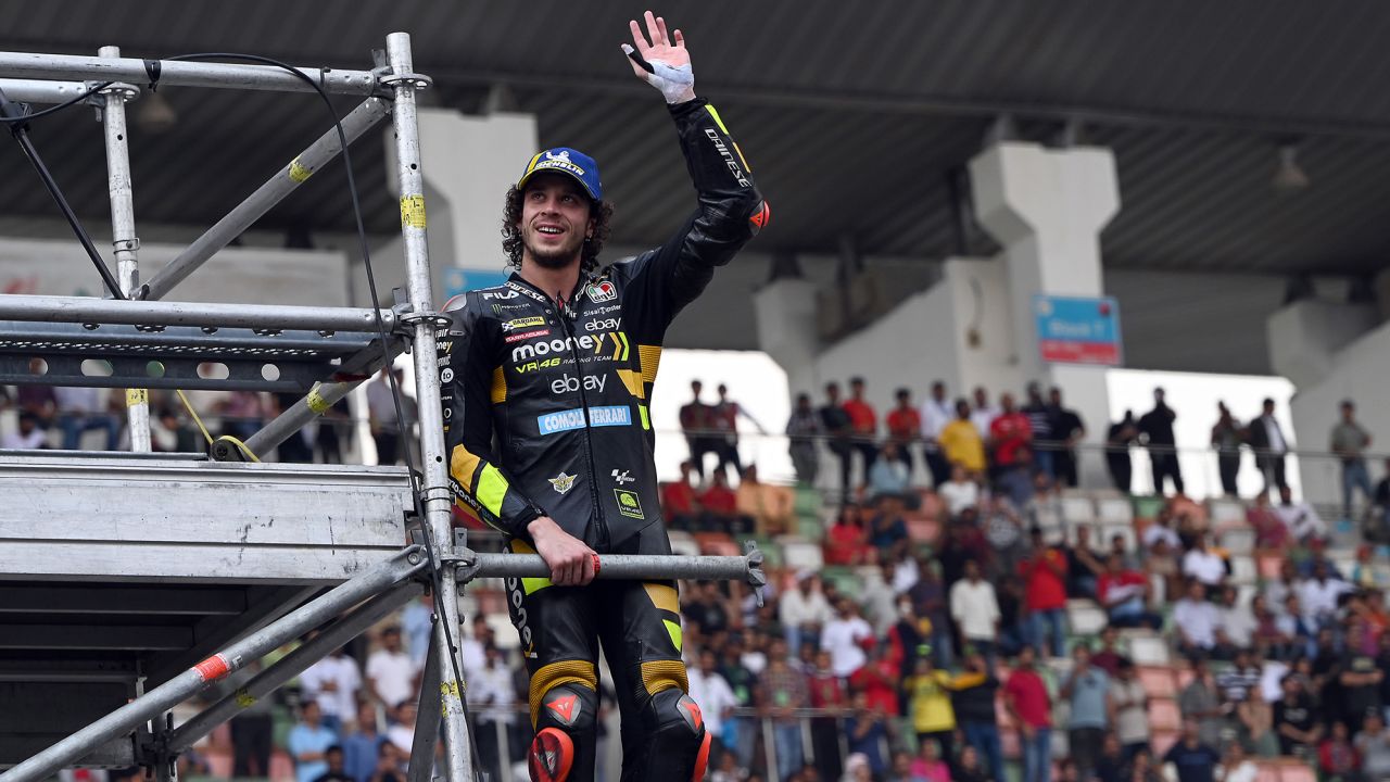 Bezzecchi waves to spectators after the Indian MotoGP Grand Prix.