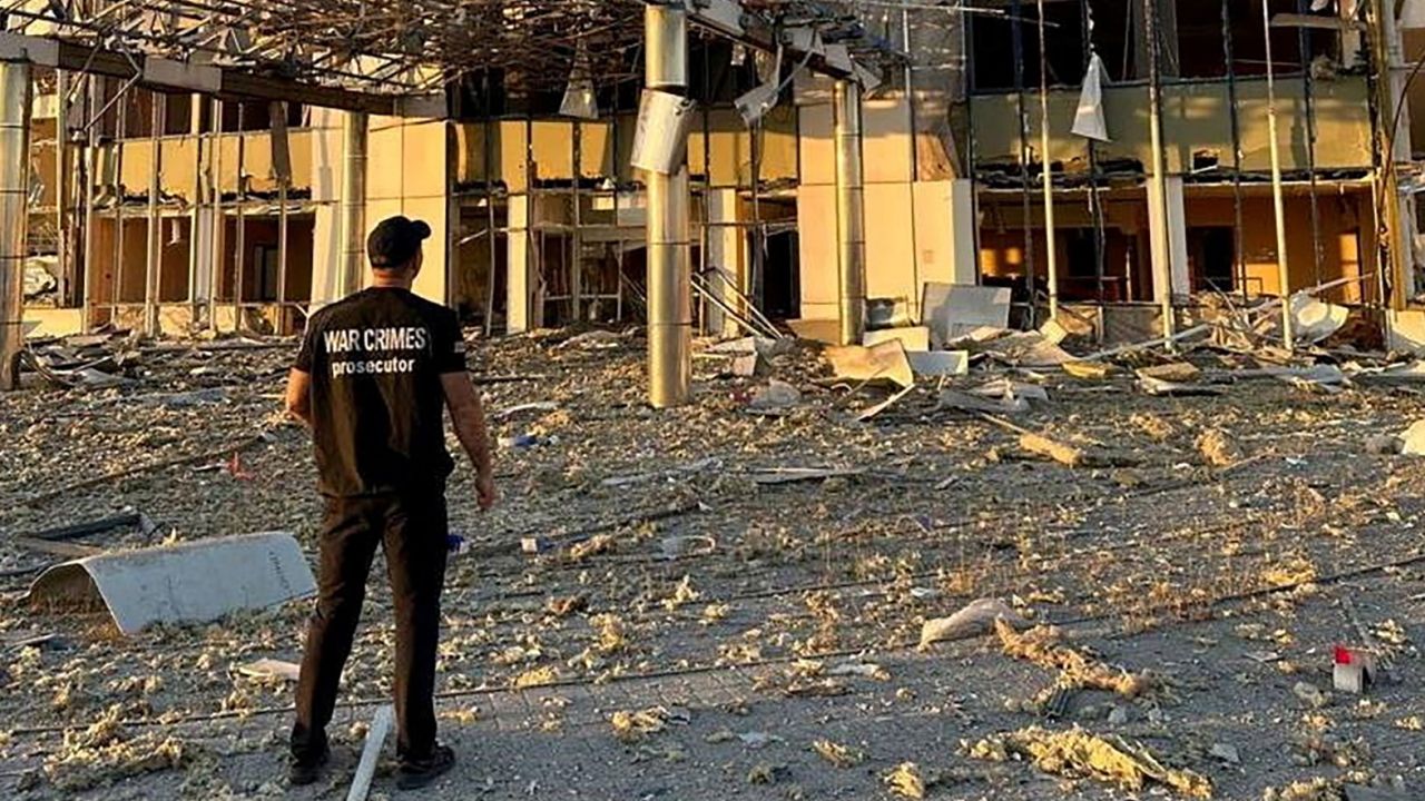 A member of Odesa Regional Prosecutor's Office personnel inspects damage following a Russian military attack, amid the country's invasion of Ukraine, in Odesa, Ukraine, in this image released September 25, 2023. 