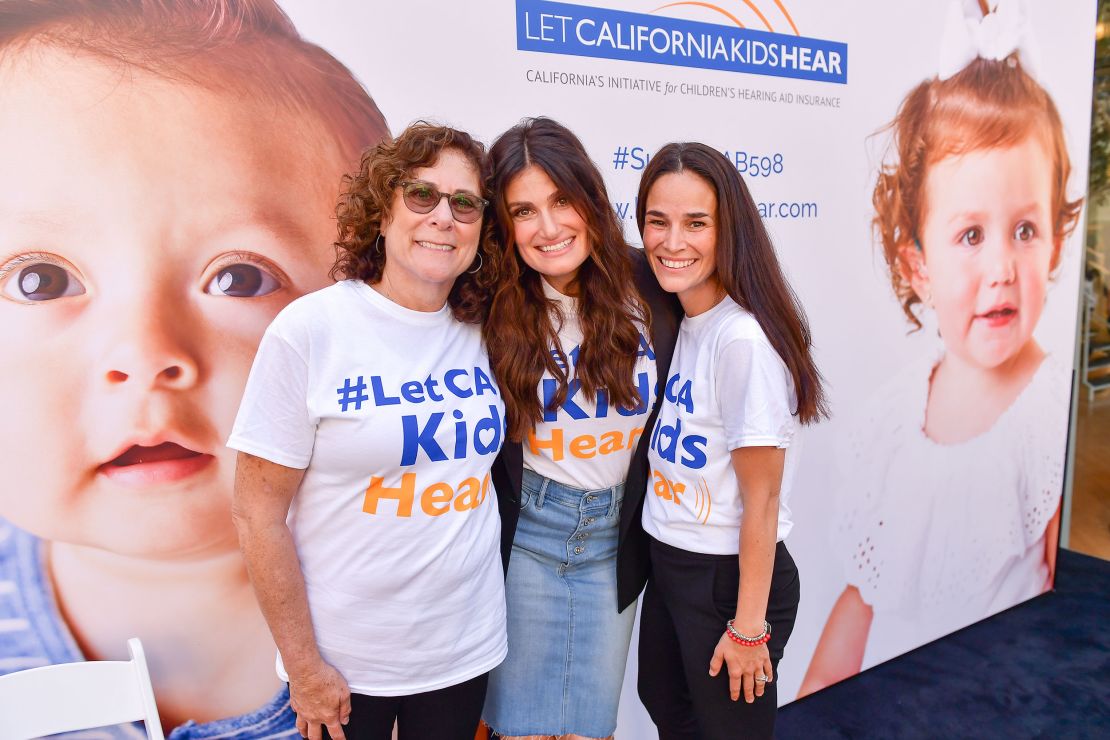 LOS ANGELES, CALIFORNIA - AUGUST 12: Lydia Sussman, Idina Menzel, and Michelle Marciniak attend the Let California Kids Hear Campaign at The Grove on August 12, 2019 in Los Angeles, California. (Photo by Matt Winkelmeyer/Getty Images for Caruso)