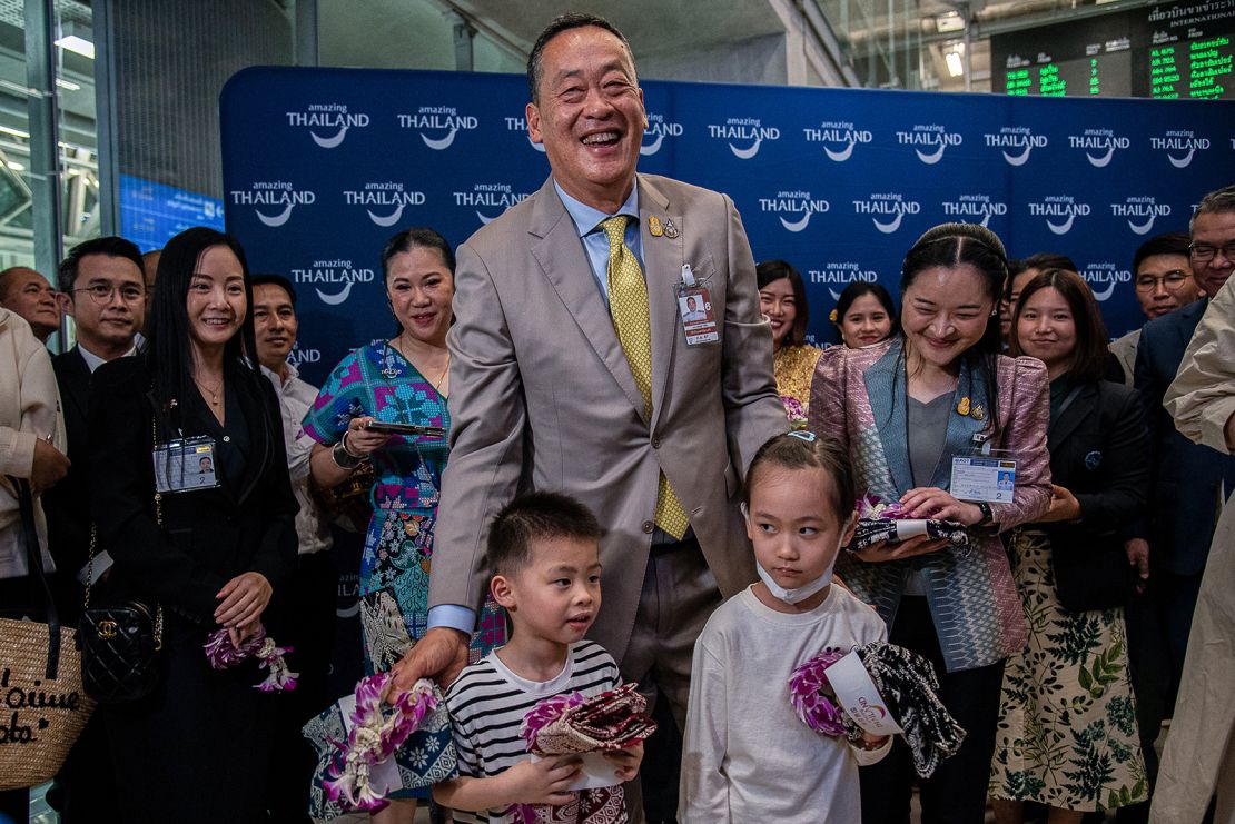 Thai Prime Minister Srettha Thavisin greeted travelers on the first day of the government's visa-free scheme for Chinese tourists.