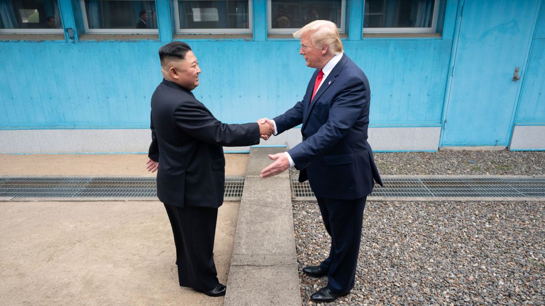 Trump shakes hands with Kim on June 30, 2019, as the two leaders meet at the Korean Demilitarized Zone.