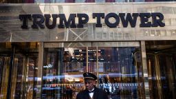 A doorman stands outside of Trump Tower, in New York, New York, on April 3, 2023.  