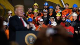 In this March 2018 photo, then-President Donald Trump speaks to a crowd gathered at the Local 18 Richfield Facility of the Operating Engineers Apprentice and Training, a union and apprentice training center specializing in the repair and operation of heavy equipment, in Richfield, Ohio. 