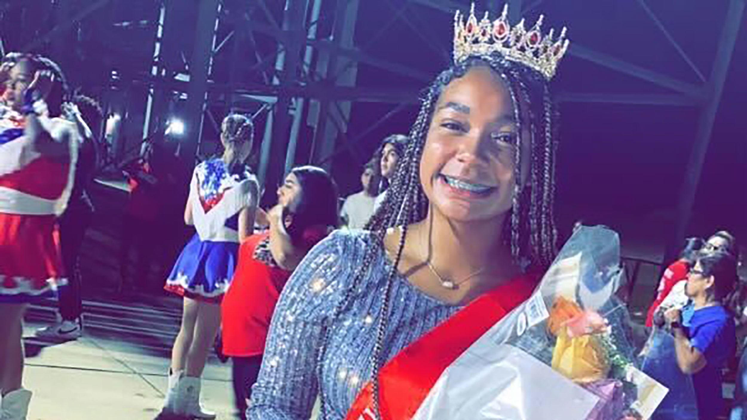 Cheerleader Crowned Homecoming Queen in Patriot Victory, School
