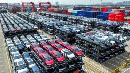 In this photo taken on September 11, 2023, BYD electric cars waiting to be loaded on a ship are stacked at the international container terminal of Taicang Port at Suzhou Port, in China's eastern Jiangsu Province. 