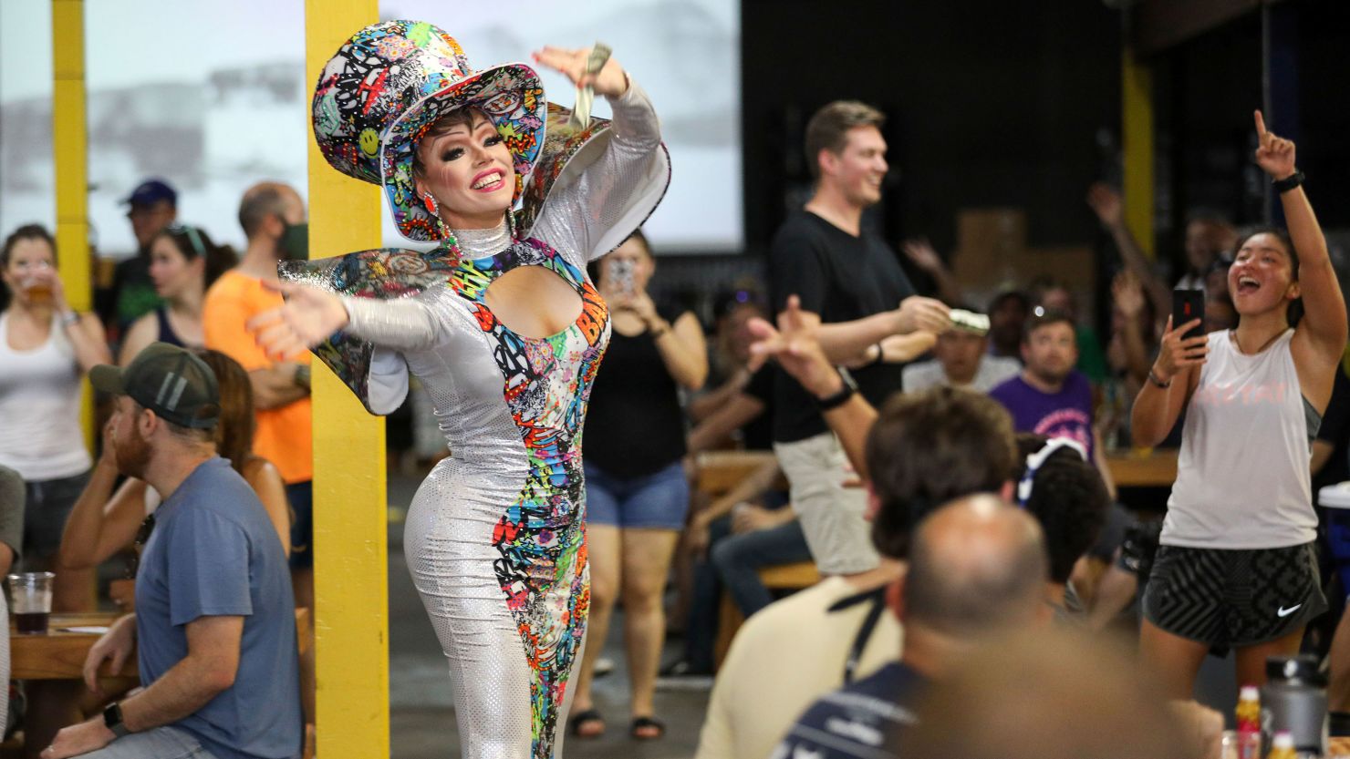 Dessie Love Blake performs a song during Eureka Heights Drag Bingo, July 29, 2021, at Eureka Heights Brewery in Houston.  (Jon Shapley/Houston Chronicle via AP)