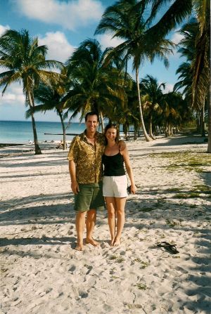 <strong>Exploring the world together:</strong> Tim and Tracy settled in Boulder, Colorado and continued to explore the world whenever they could. Here's the couple on a beach in Cuba in 2002.