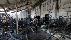 People gather at the site of a fatal fire at a wedding celebration, in the district of Hamdaniya in Iraq's Nineveh province, Iraq, September 27, 2023. REUTERS/Khalid Al-Mousily