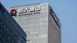The China Evergrande Group logo displayed atop the company's headquarters in Shenzhen, China, on Thursday, Sept. 30, 2021. 