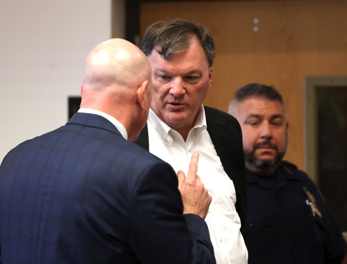 Rex Heuermann appeared with his lawyer Michael Brown, left, at Suffolk County Court in Riverhead, New York, on Wednesday.