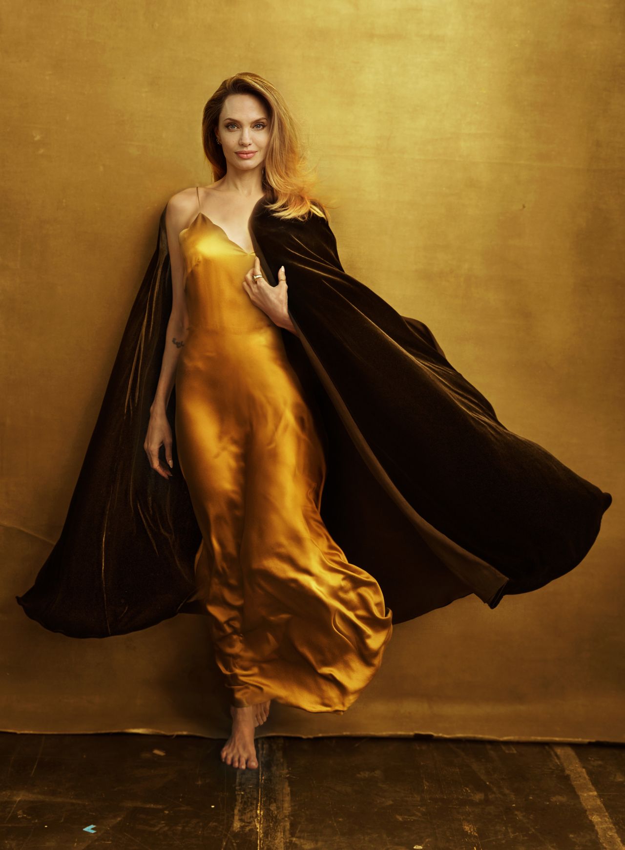 Jolie in a slip dress and velvet cape from Atelier Jolie. The actor and filmmaker worked closely with two of her children, Zahara and Pax, and the launch of the project.